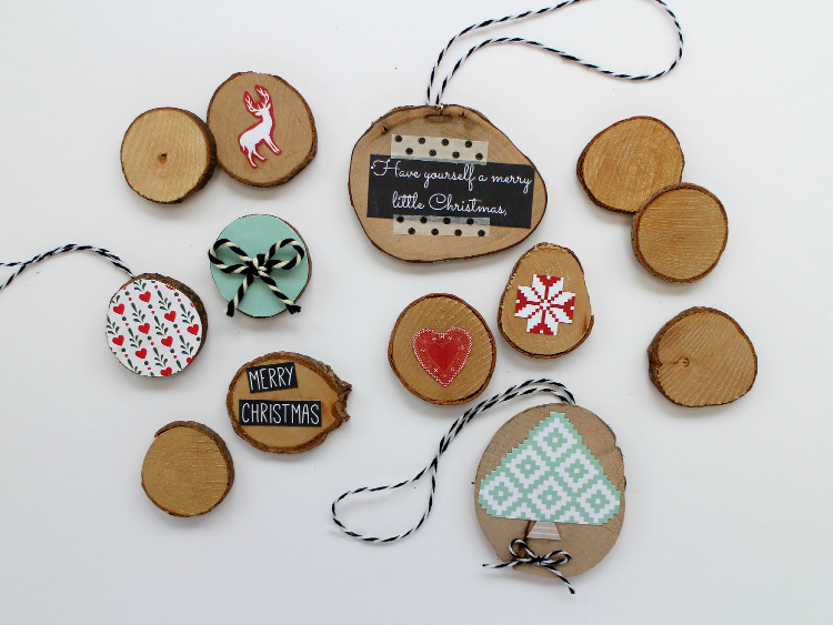 Wooden discs decorated with scrapbook paper