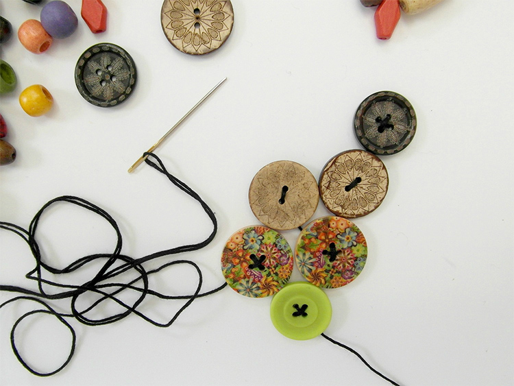 Stringing wooden buttons