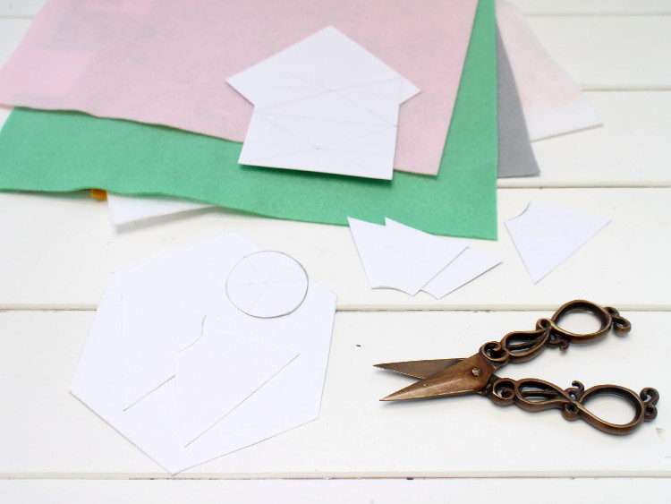 Decide on your shapes and cut them out of white cardboard