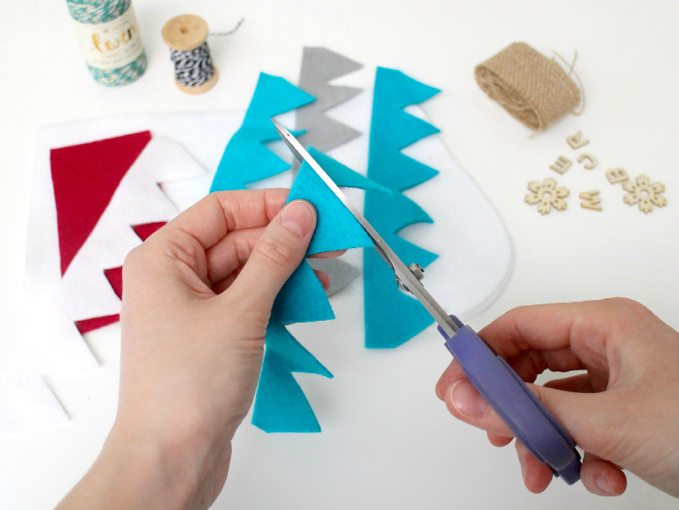 Cut out your felt shapes and arrange them in place