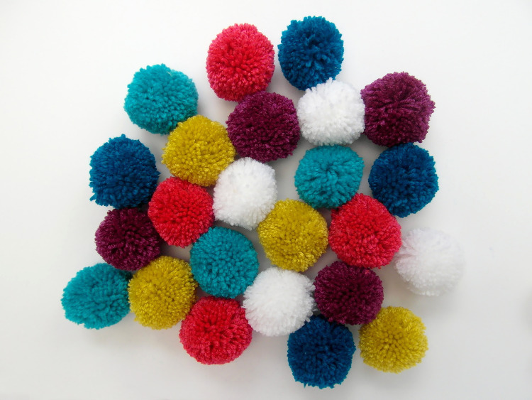 Colourful woollen pompoms