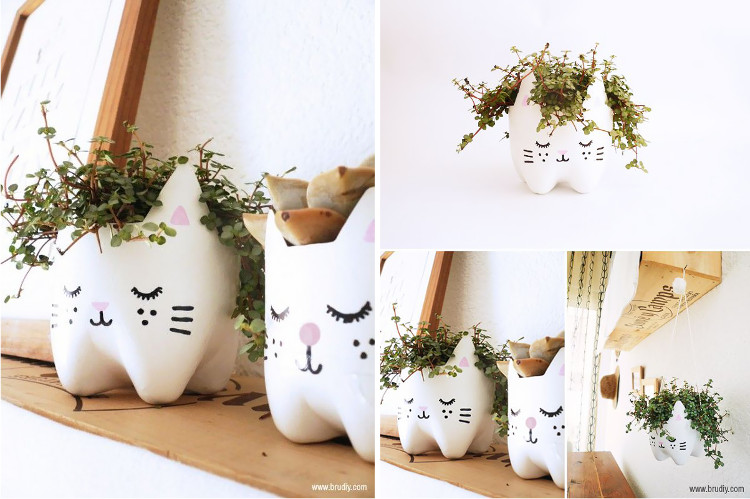 Cat planters made from painted plastic bottles