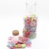 Bottle of pastel buttons