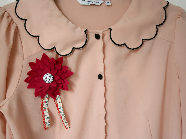 Wearing the corsage on a blouse or jacket